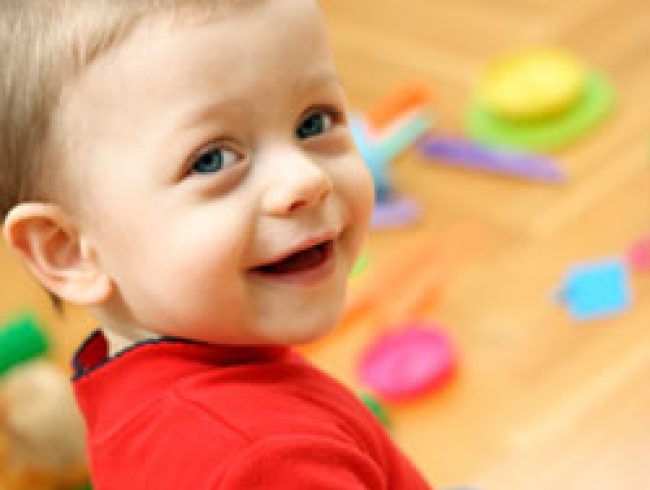 Image d'un enfant souriant | Image of a smiling child