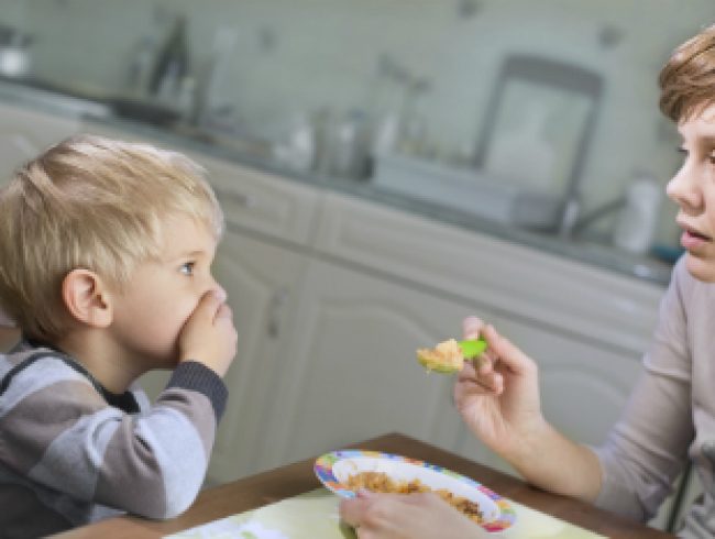 Q: Lately my toddler absolutely refuses to eat at meal times but I’m hesitant to give him more to eat at other times of the day. What can I do to ensure that he eats with the rest of the family?