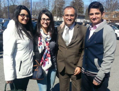 Joe (r.) with his sisters Serena, Pamela, and his father Charles.